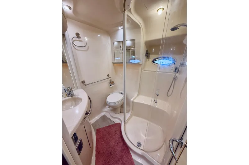 Slide: The Image of Luxurious bathroom in 2003 Sea Ray 560 Sedan Bridge yacht with shower and vanity. - 67