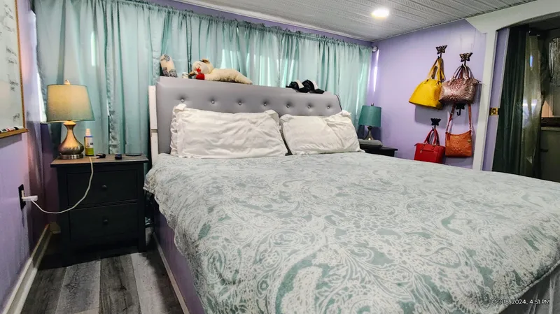 Slide: The Image of Cozy bedroom with pastel walls and decorative pillows. - 21