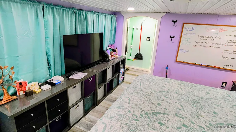 Slide: The Image of Cozy bedroom with TV, turquoise curtains, and whiteboard, Kelly 62', 1964. - 22