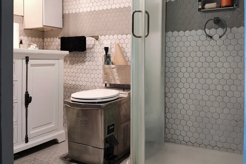 Slide: The Image of Retro bathroom with hexagonal tiles and Kelly 62' model toilet. - 27