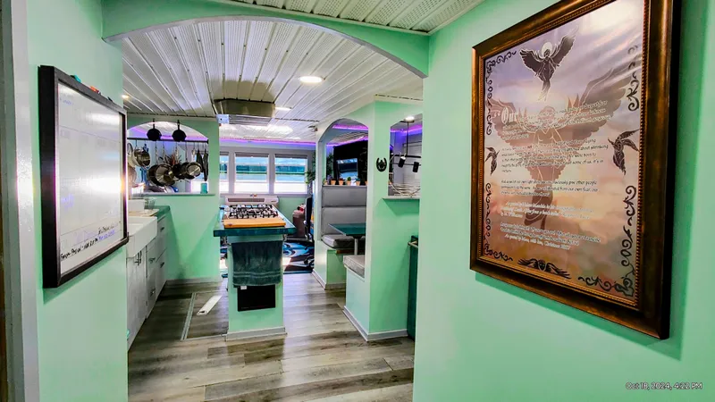 Slide: The Image of Interior of a 1964 Kelly 62' with modern kitchen and decor. - 29