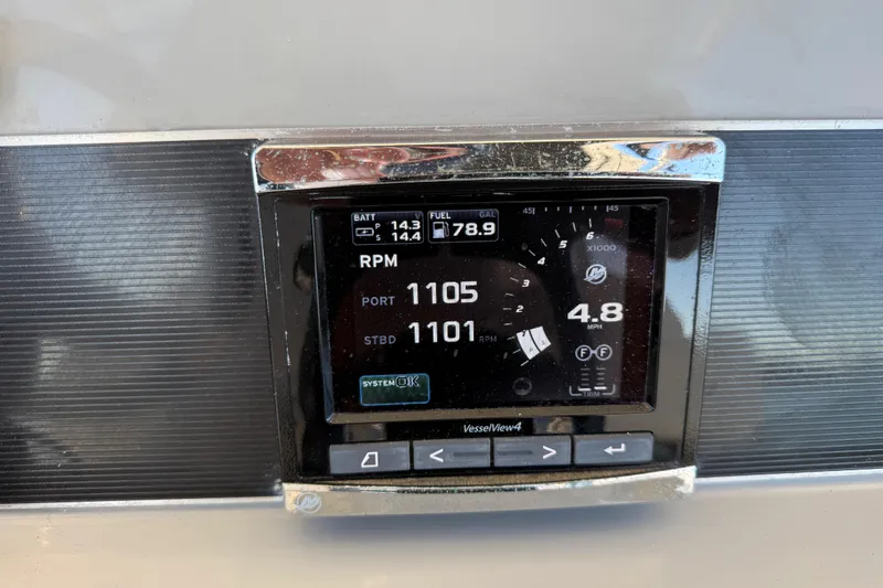 Slide: The Image of Digital display on 2016 Boston Whaler 270 Dauntless showing RPM and fuel levels. - 18