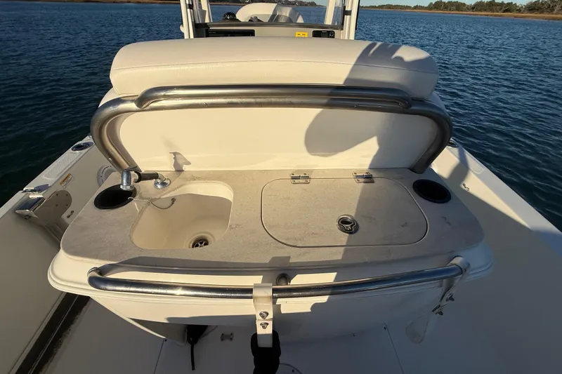 Slide: The Image of 2016 Boston Whaler 270 Dauntless boat with sink and storage on deck. - 37