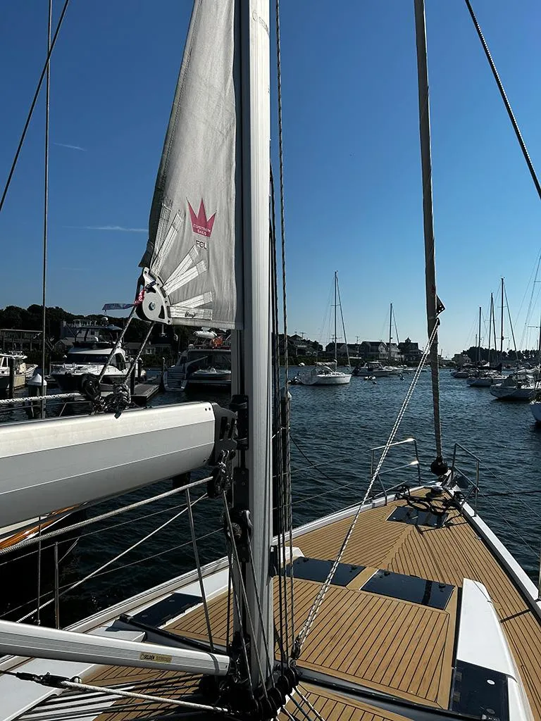 Slide: The Image of 2016 Hanse 455 sailboat docked in sunny marina. - 2