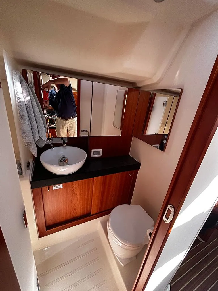 Slide: The Image of Bathroom in Hanse 455 sailboat, year 2016. - 24