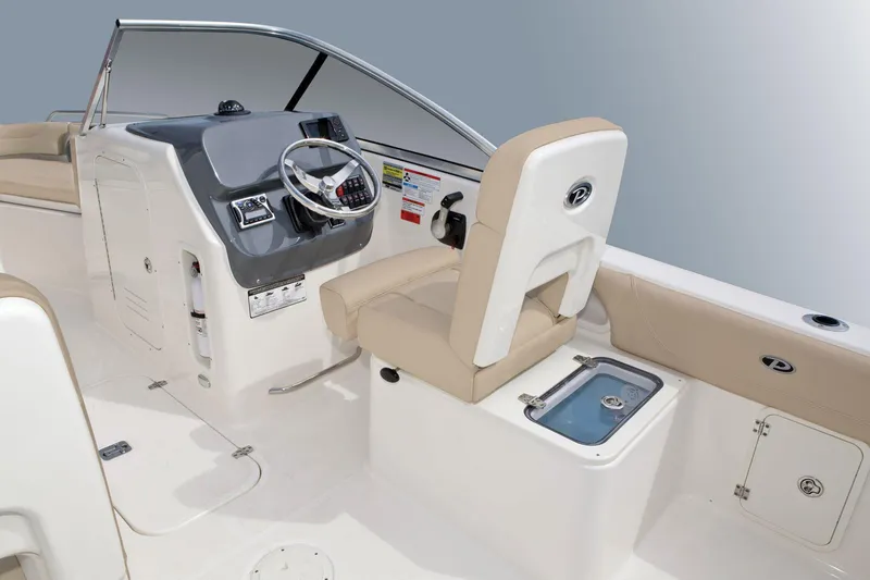 Slide: The Image of Manufacturer Provided Image: 2016 Pursuit DC 235 Dual Console boat interior with helm and seating. - 25