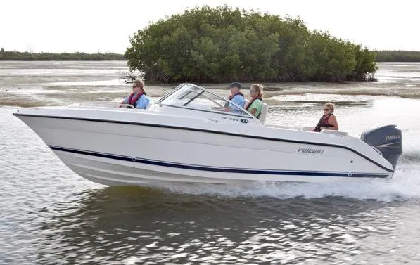 Slide: The Image of Manufacturer Provided Image: 2016 Pursuit DC 235 Dual Console boat cruising with passengers. - 26