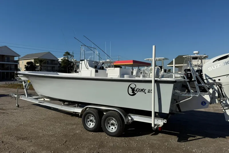 Slide: The Image of 2026 C-Hawk 25 Center Console boat with spacious deck and modern controls. - 3