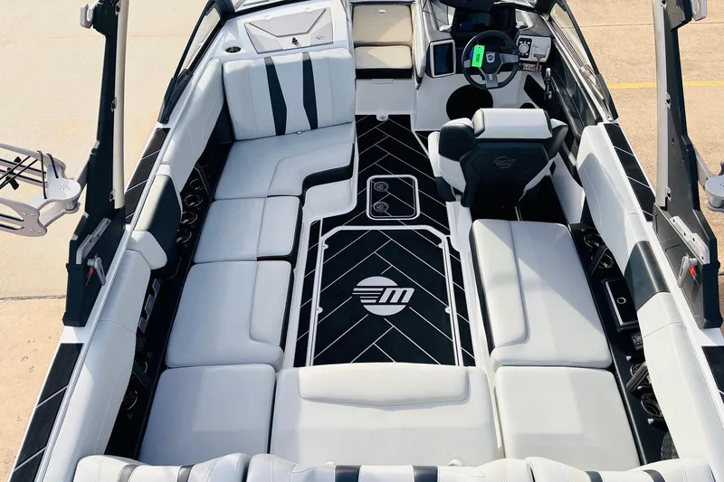 Slide: The Image of 2024 Malibu Wakesetter 22 LSV interior with sleek seating and modern design. - 11
