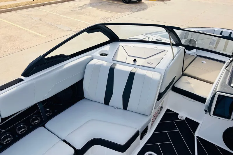 Slide: The Image of 2024 Malibu Wakesetter 22 LSV interior with sleek white seating and modern design. - 14