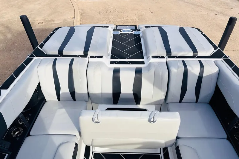 Slide: The Image of 2024 Malibu Wakesetter 22 LSV interior with sleek, modern seating design. - 23