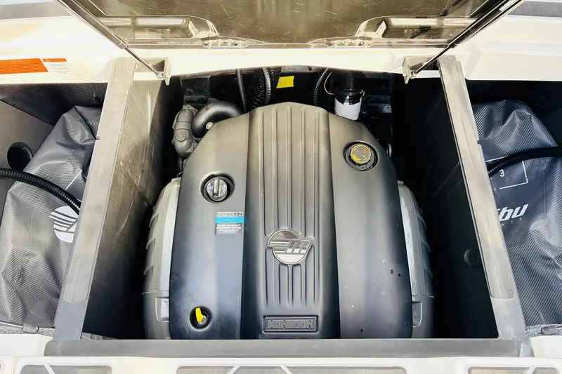 Slide: The Image of 2024 Malibu Wakesetter 22 LSV engine compartment showcasing Monsoon engine. - 40