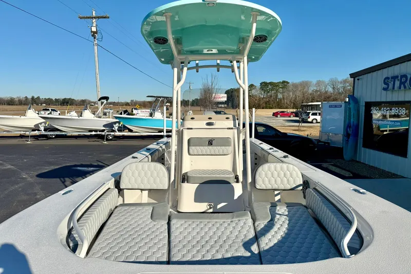 Slide: The Image of 2026 Carolina Skiff 26 Ultra Elite boat with spacious seating and modern design. - 12