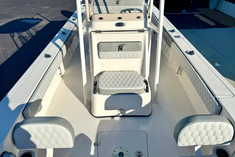 Slide: The Image of 2026 Carolina Skiff 26 Ultra Elite boat interior with cushioned seating and sleek design. - 24