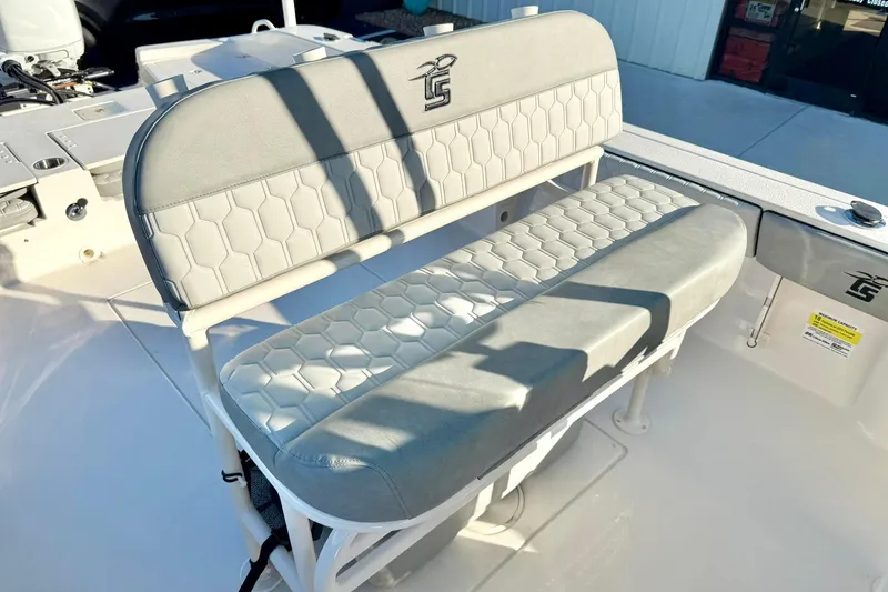 Slide: The Image of 2026 Carolina Skiff 26 Ultra Elite boat seating with hexagonal pattern upholstery. - 29