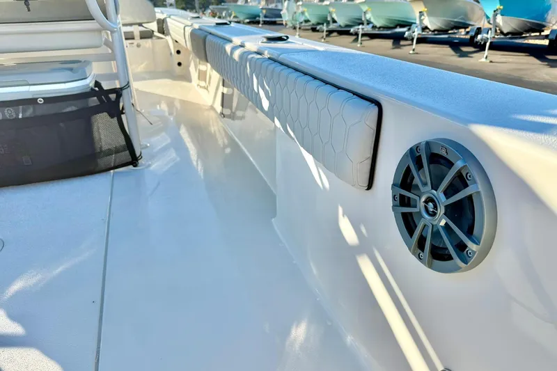 Slide: The Image of 2026 Carolina Skiff 26 Ultra Elite boat interior with speaker and seating detail. - 43