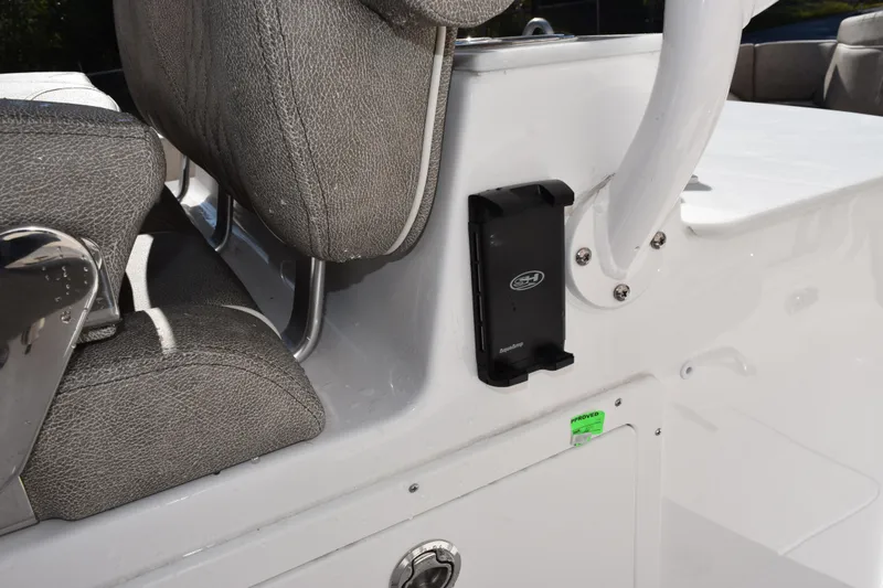 Slide: The Image of 2026 Sea Hunt Ultra 305 Coffin Box interior with seating and storage features. - 21