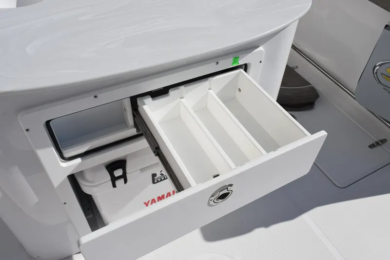 Slide: The Image of Open storage drawer on 2026 Sea Hunt Ultra 305 Coffin Box boat. - 23
