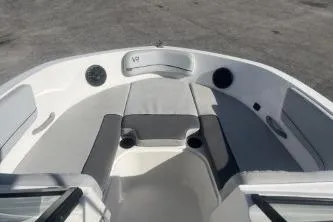 Slide: The Image of 2023 Bayliner VR5 Bowrider OB interior with spacious seating and modern design. - 8