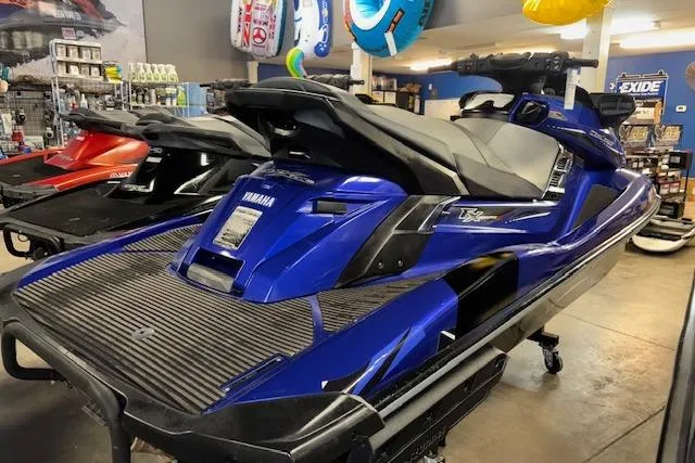 Slide: The Image of 2014 Yamaha WaveRunner FX Cruiser HO in showroom, blue color, rear view. - 4
