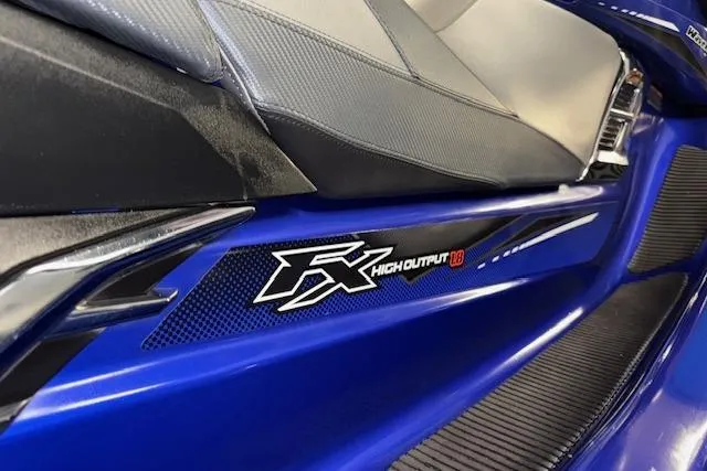 Slide: The Image of 2014 Yamaha WaveRunner FX Cruiser HO, blue with high output branding detail. - 5