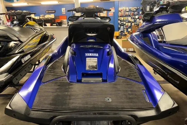 Slide: The Image of 2014 Yamaha WaveRunner FX Cruiser HO in showroom, blue color, rear view. - 6
