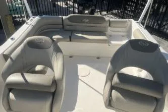 Slide: The Image of 2023 Key West 203 DFS boat interior with comfortable seating arrangement. - 10