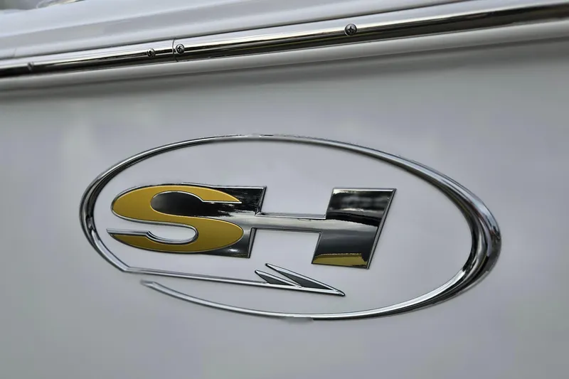 Slide: The Image of 2026 Sea Hunt BX 25 FS logo on boat exterior. - 26