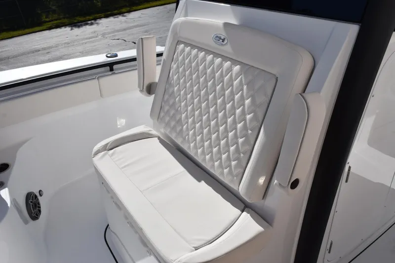 Slide: The Image of 2026 Sea Hunt Ultra 285 SE boat with luxurious white quilted seating. - 15