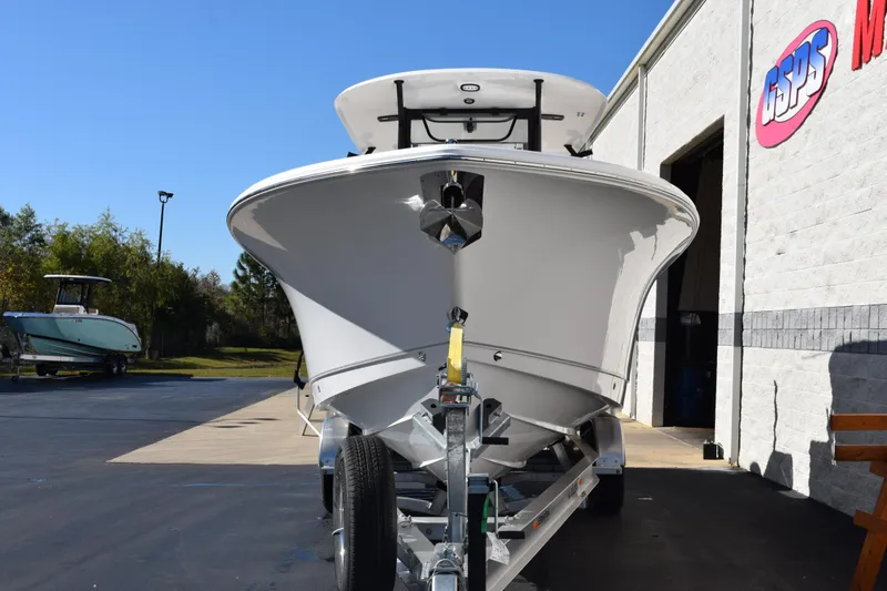 Slide: The Image of 2026 Sea Hunt Ultra 285 SE boat on trailer outside dealership. - 3