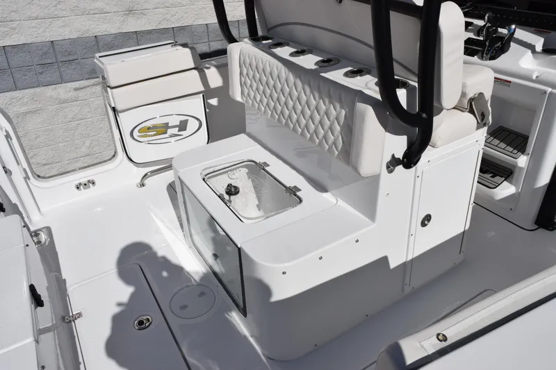 Slide: The Image of 2026 Sea Hunt Ultra 285 SE boat interior with seating and storage features. - 8