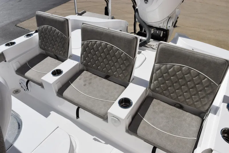Slide: The Image of Three cushioned seats on 2026 Sea Hunt BX 25 FS boat, featuring diamond-pattern upholstery. - 10