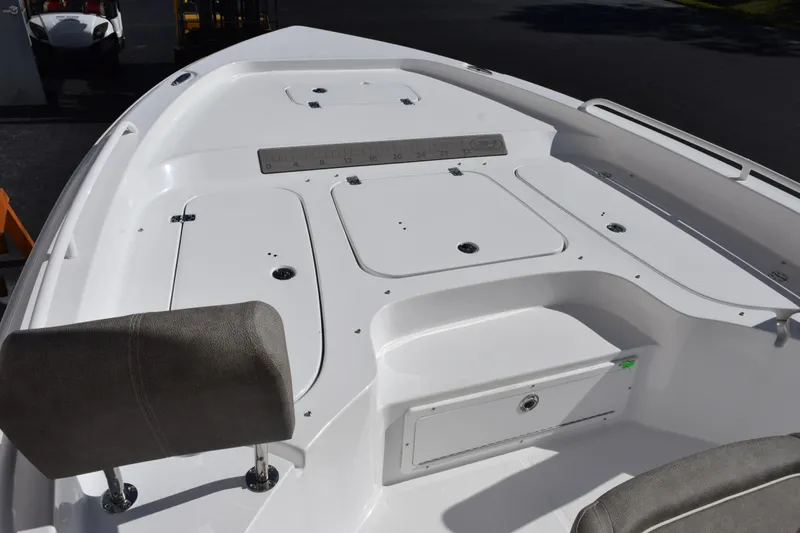 Slide: The Image of 2026 Sea Hunt BX 25 FS boat deck with storage compartments and seating. - 15