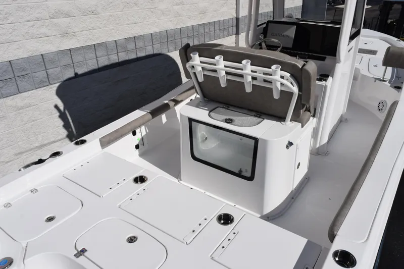 Slide: The Image of 2026 Sea Hunt BX 25 FS boat interior with seating and storage compartments. - 7