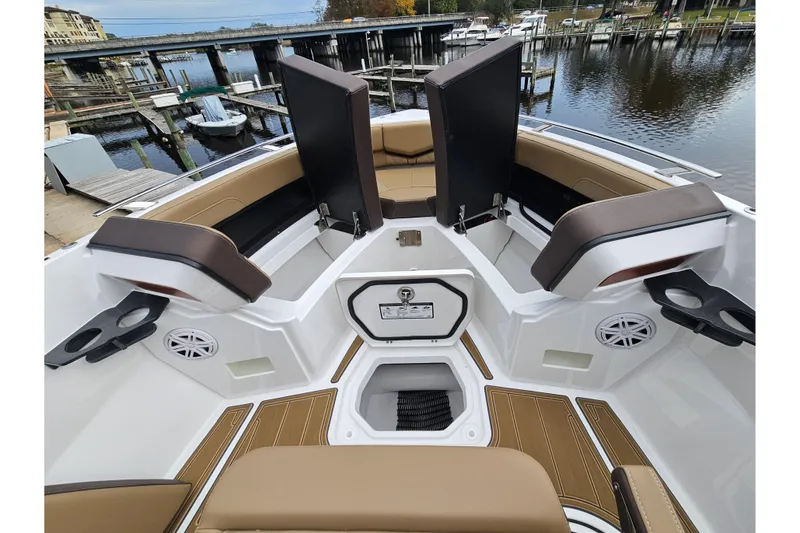 Slide: The Image of Luxury interior of 2026 Monterey Elite 27 OB boat with seating and storage. - 20