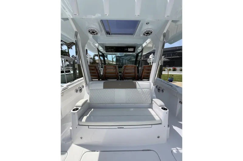 Slide: The Image of 2024 Bertram 39 CC boat interior with seating and modern design features. - 51