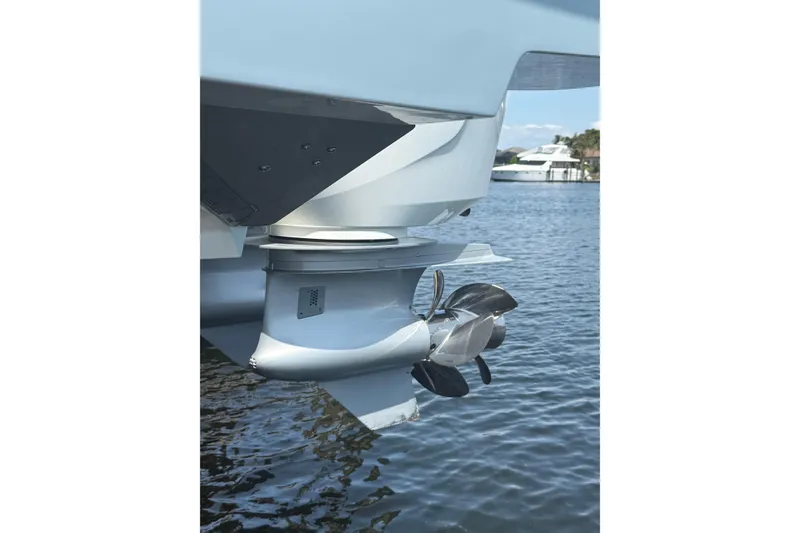 Slide: The Image of 2024 Bertram 39 CC boat propeller in water, showcasing sleek design and engineering. - 55