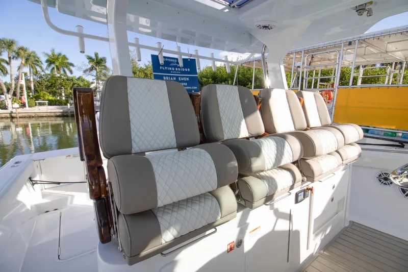 Slide: The Image of 2024 Bertram 39 CC boat with luxurious seating and modern design. - 83