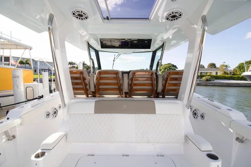 Slide: The Image of 2024 Bertram 39 CC boat interior with seating and modern design. - 87