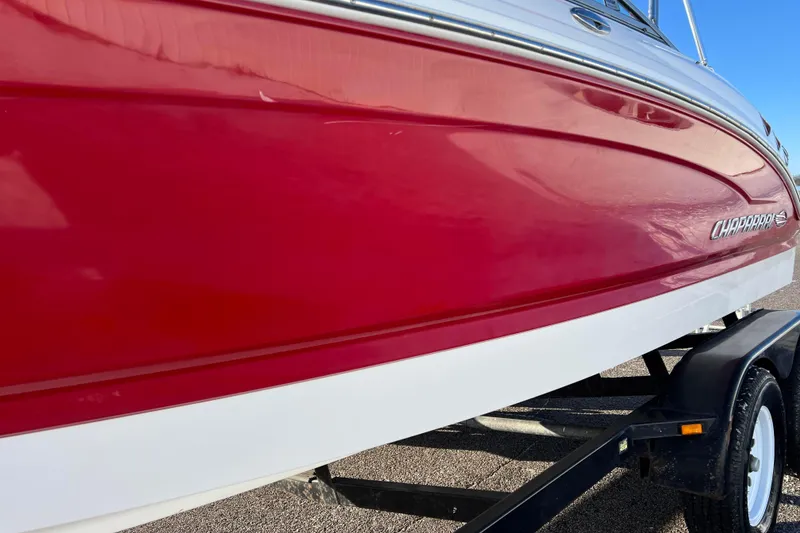 Slide: The Image of Red and white 2010 Chaparral 216 SSi boat on trailer, side view. - 21
