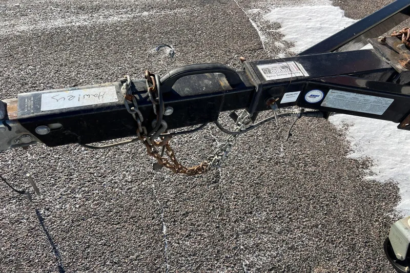 Slide: The Image of Trailer hitch of a 2010 Chaparral 216 SSi on a textured surface. - 67