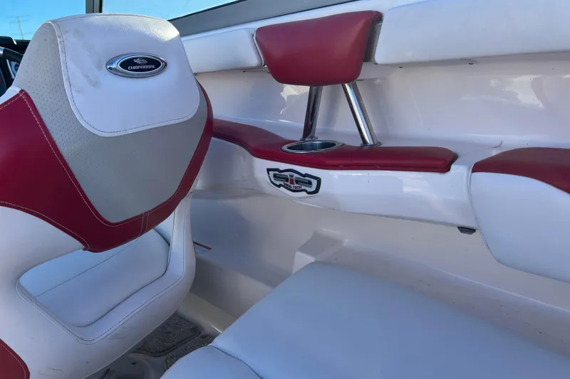 Slide: The Image of Interior of 2010 Chaparral 216 SSi boat with red and white seating. - 73