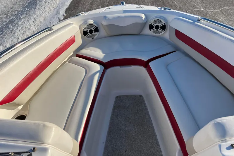 Slide: The Image of Interior of 2010 Chaparral 216 SSi boat with red and white seating. - 83