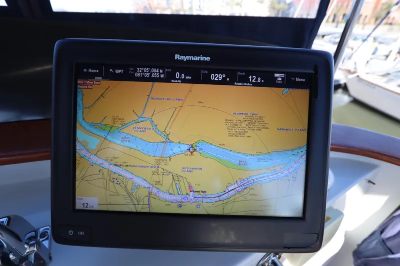 Slide: The Image of Raymarine navigation display on 2005 Monk 36 boat, showing detailed nautical chart. - 32