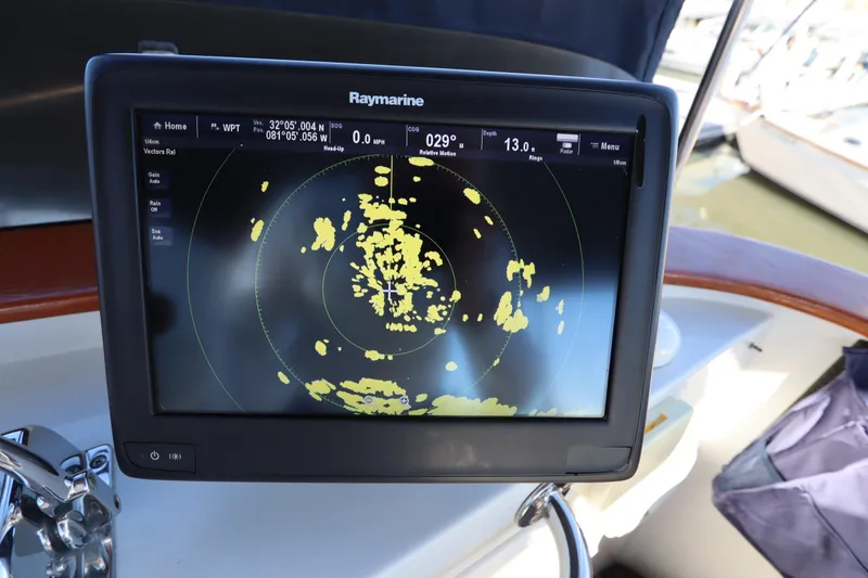 Slide: The Image of Raymarine radar display on a 2005 Monk 36 boat, showing navigation data. - 33