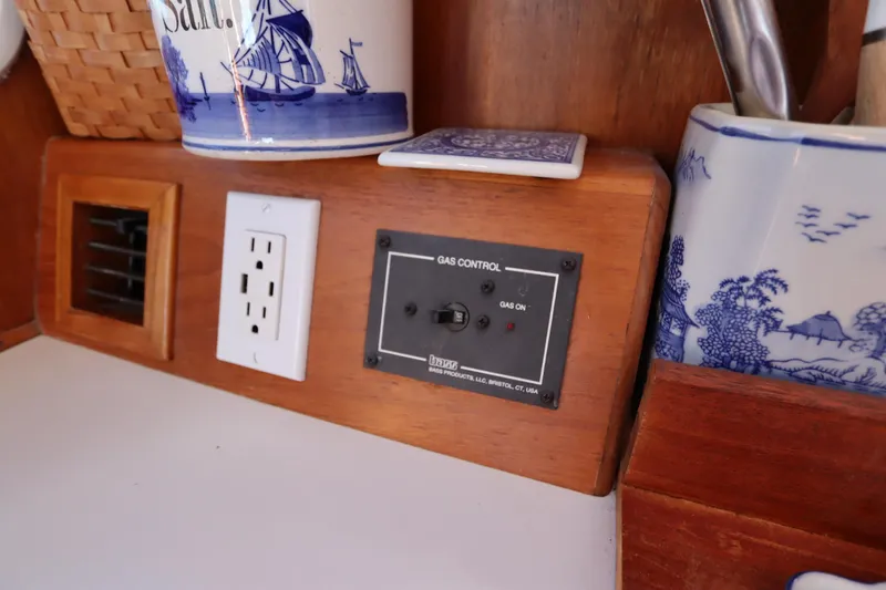 Slide: The Image of Monk 36 boat interior with gas control panel and electrical outlet, 2005 model. - 40