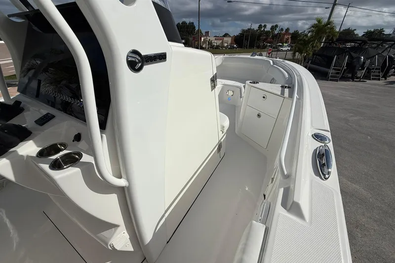 Slide: The Image of 2021 Edgewater 262CC boat interior with sleek design and storage compartments. - 25