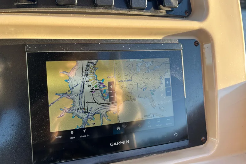 Slide: The Image of Garmin navigation display on 2022 Godfrey Sweetwater 2286 C boat dashboard. - 18
