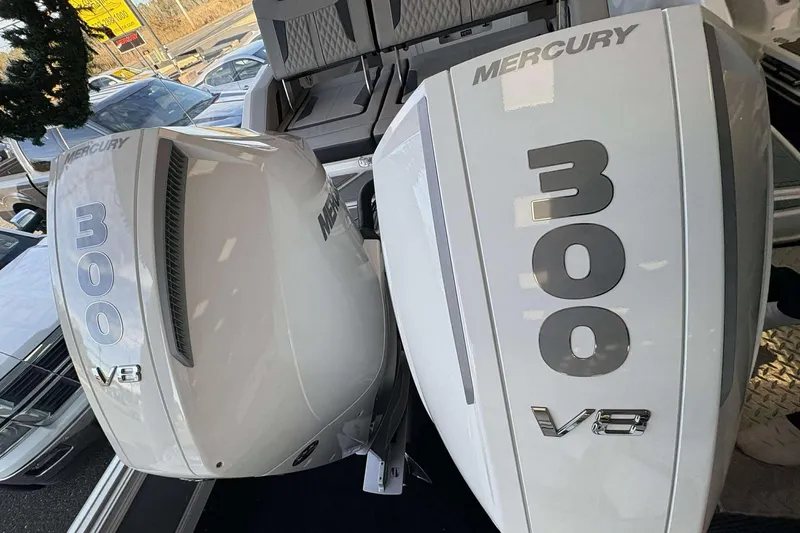 Slide: The Image of Twin Mercury 300 V8 engines on a 2026 Monterey Elite 30 OB boat. - 35