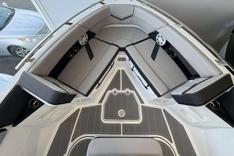 Slide: The Image of 2026 Monterey Elite 30 OB boat interior with luxurious seating and modern design. - 6